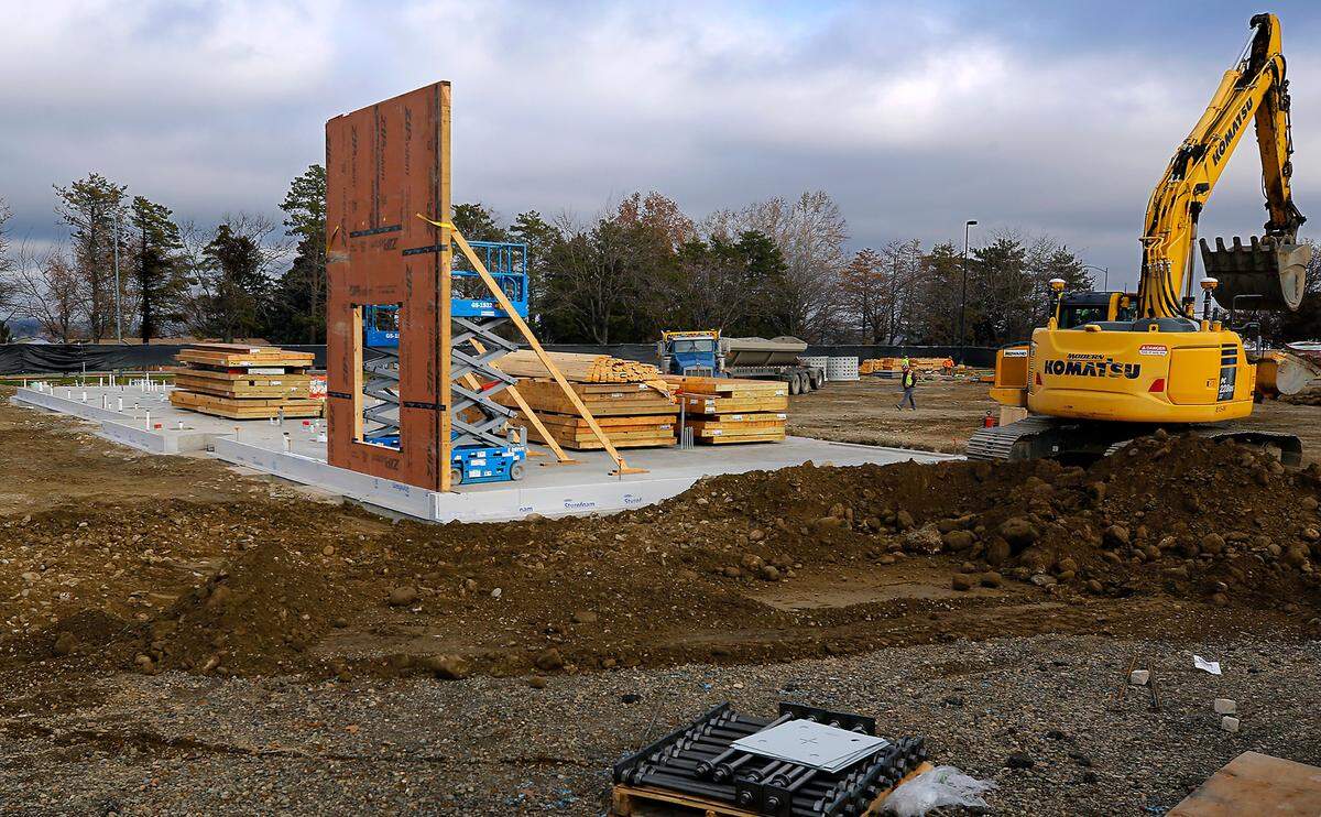 The first section of wall is in place for the new 5,000-square-foot Chick-fil-A restaurant at 7009 W. Canal Drive in Kennewick. The new building includes a kitchen, inside seating for 70, patio seating for 24, 96 parking stalls and features a two-lane drive through. The existing parking lot has fenced off for the installation of buried utilities and construction of the structure. Photo taken on Jan 16, 2025.