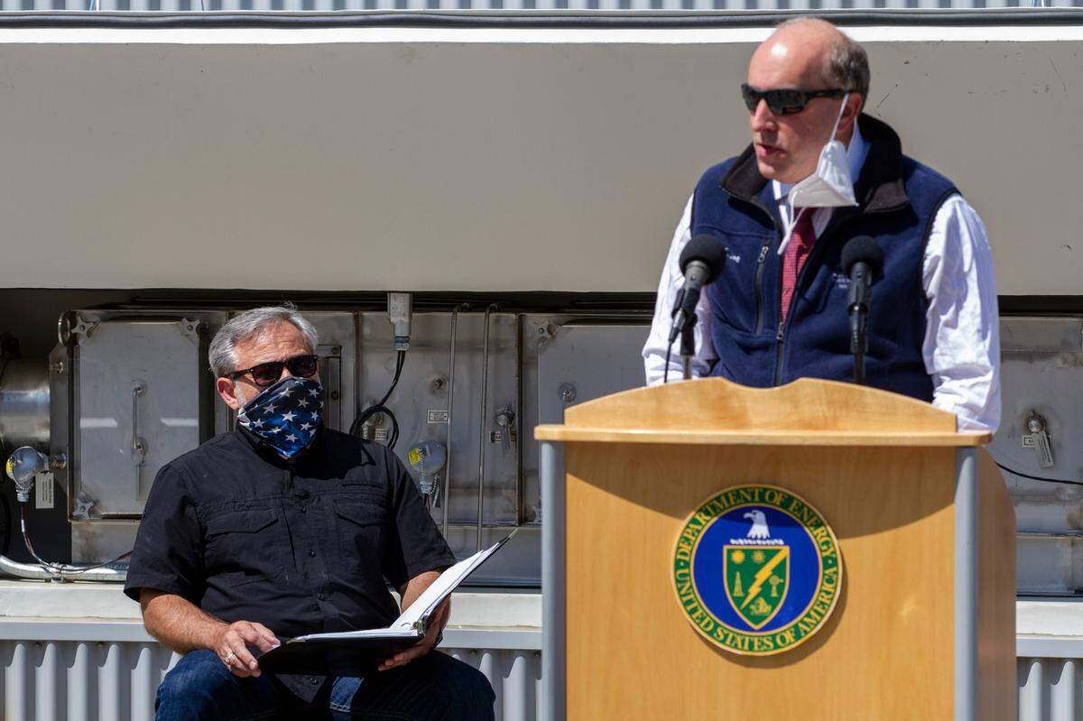 Energy Secretary Dan Brouillette listens as Paul Dabbar, the under secretary of energy for science, speaks after both toured a waste pretreatment system made for Hanford at AVANTech in Richland.