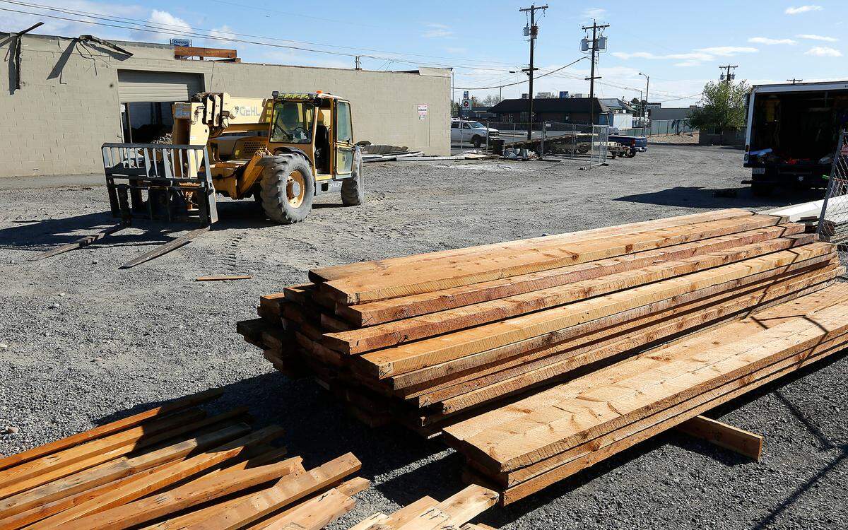 This lumber, removed during the demolition phase, is being repurposed in the remodel of a 1953 building on West Kennewick Avenue.