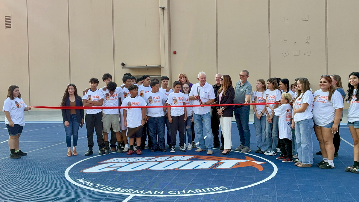 Olympian Nancy Lieberman and community leaders officially open Washington’s first Dream Court with a ribbon-cutting ceremony.