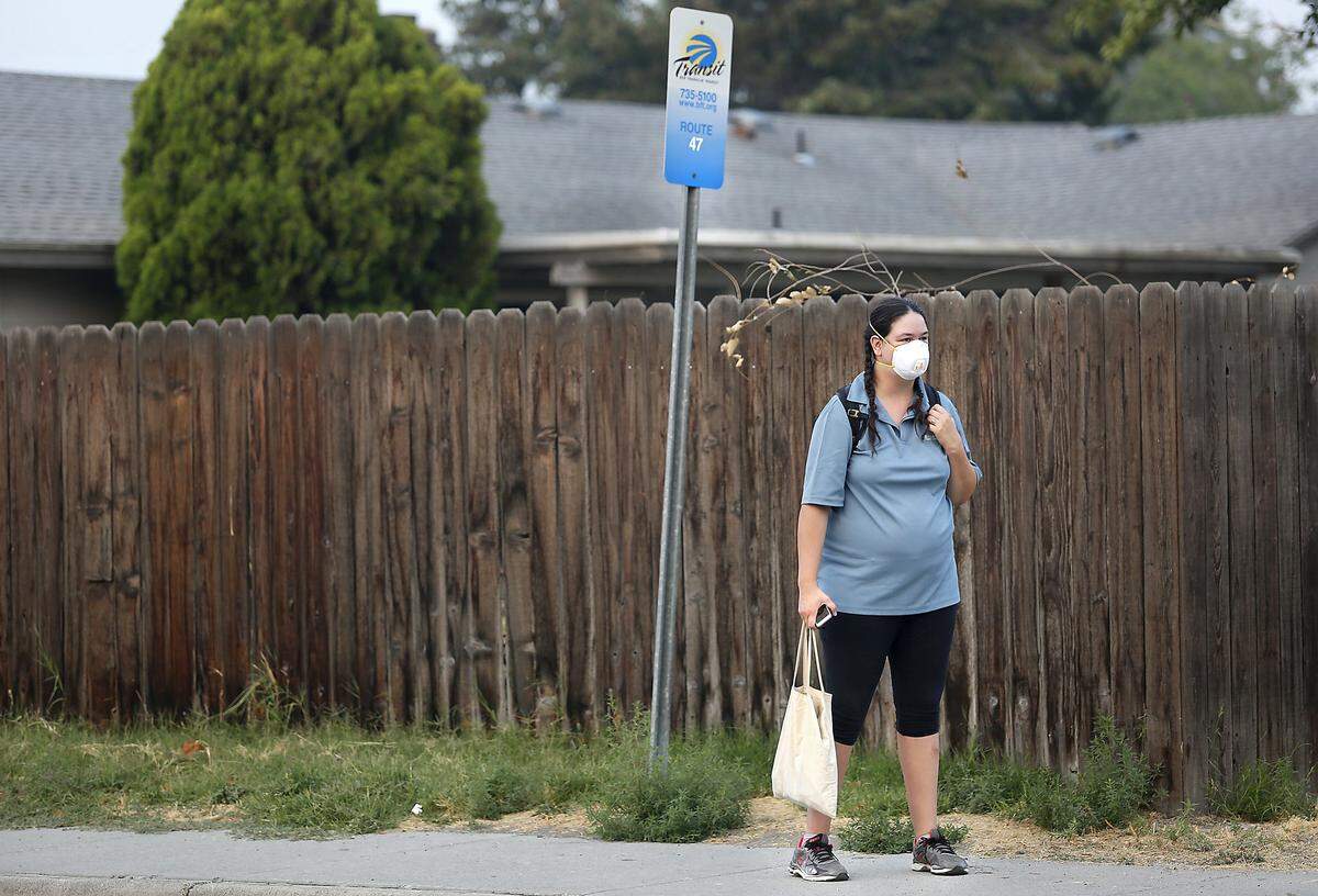 Doctors say people who spend anytime outdoors should wear masks with small enough pores to filter out smoke particles. They should be rated N95 and can be purchased at home improvement and hardware stores.