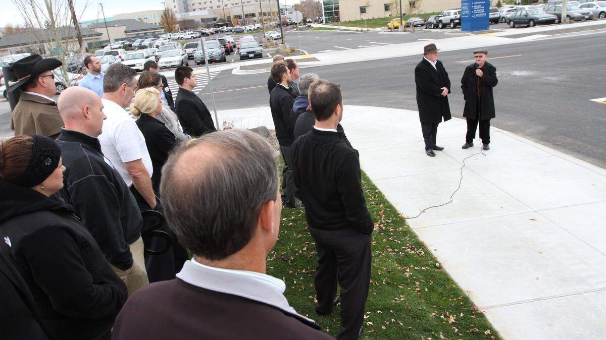 John Fox, holding the microphone, was the Richland Mayor when he spoke at the dedication of Kadlec Way in 2013. He died Sept. 26, 2023.