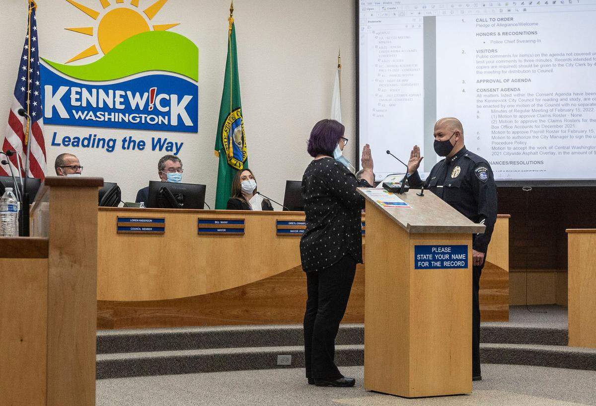 Chris Guerrero is sworn in as Kennewick’s new police chief during a Kennewick City Council meeting on Tuesday evening. Chief Guerrero was formerly the Assistant Police Chief under Ken Hohenberg, who recently retired.