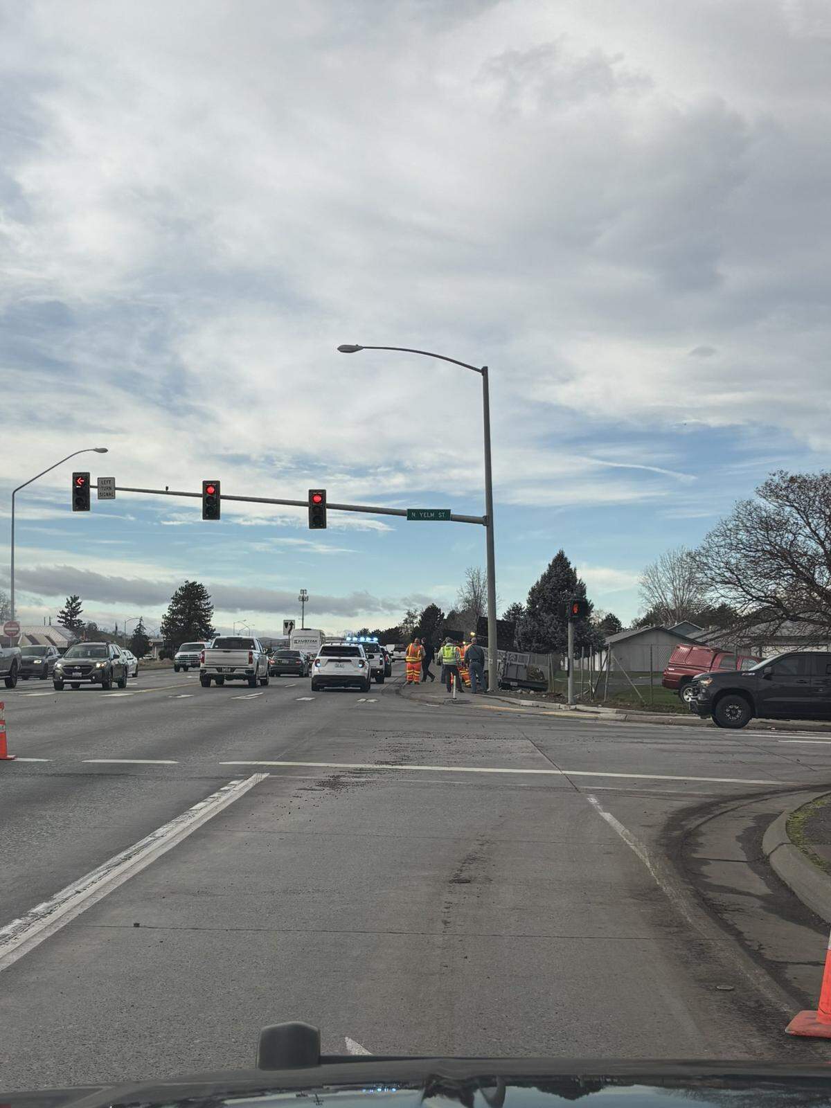 A pickup crashed through a Highway 395 work site and left four state road workers hurt.