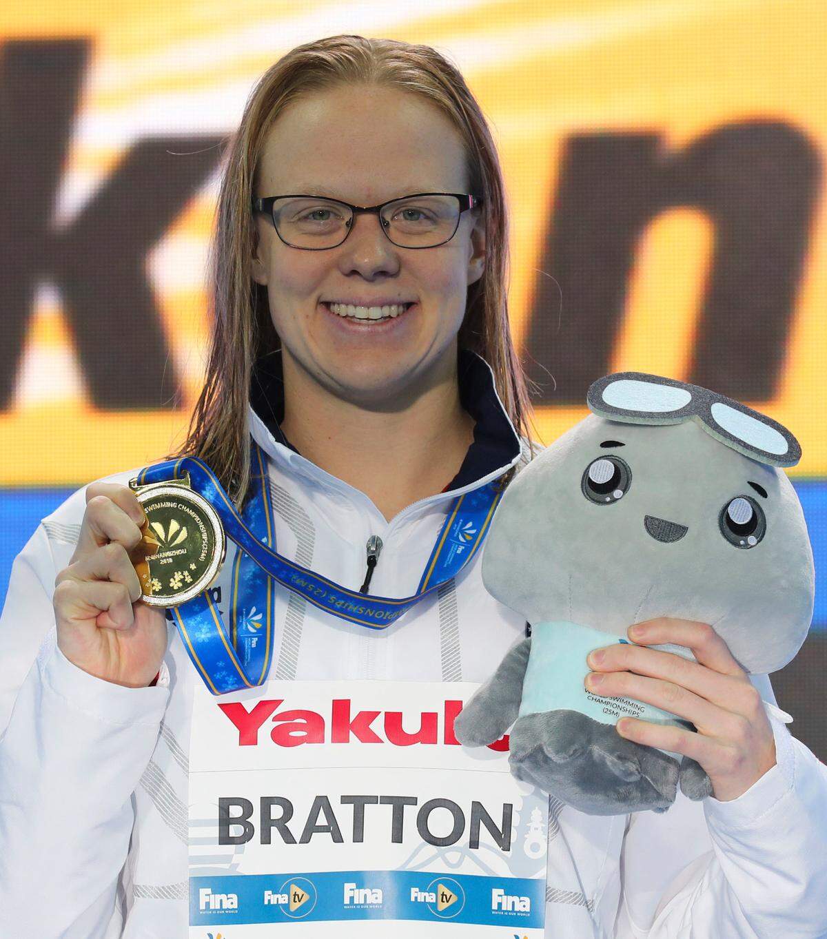Gold medalist USA’s Lisa Bratton poses during ceremonies at the women’s 200m backstroke during the 14th FINA World Swimming Championships in Hangzhou in eastern China’s Zhejiang Province in 2018.