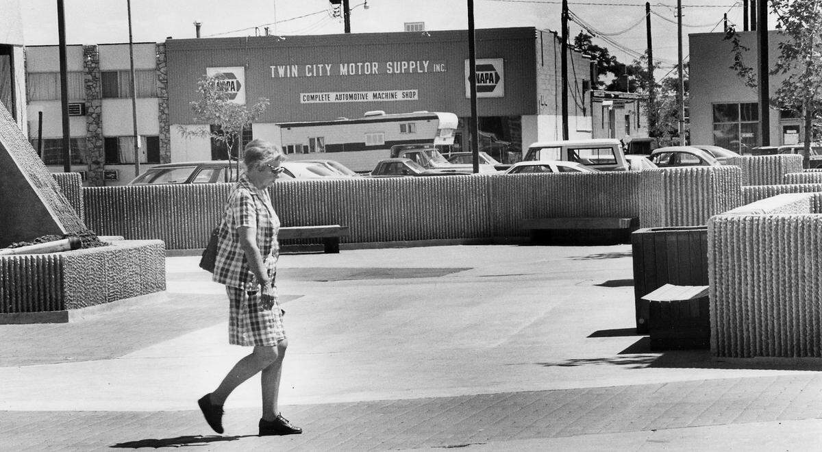 A woman walks past Peanuts Park in downtown Pasco in this photo published in the Tri-City Herald in June, 1977.