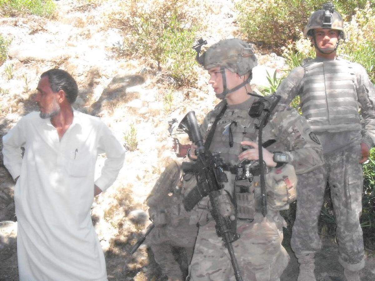 Casey Landru, center, served with the U.S. Army in Afghanistan.