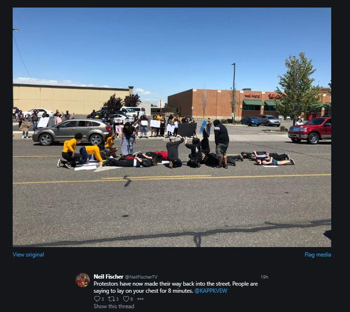 A tweet from KVEW TV shows some protesters lying in the turn lane at Court Street and 20th Avenue in Pasco.