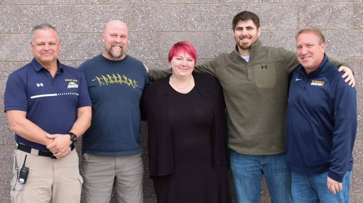 Quick action by Desert Hills Middle School staff members Courtney Bissinger, Kurtis Clawson, Ken Lattin, Ben Schuldheisz and Shaun Suss is credited with saving a student’s life.