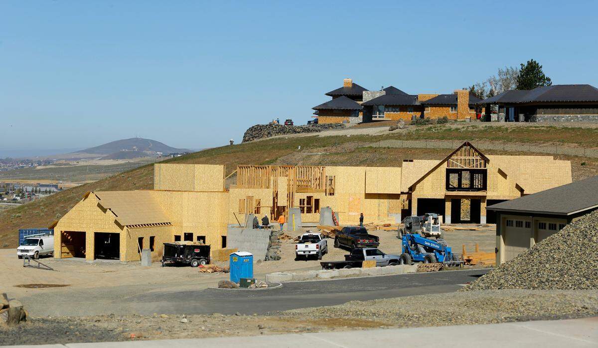 A new large home being is pictured during construction in south Kennewick near Canyon Lakes at 4618 S. Reed St. in this April 2021 file photo.