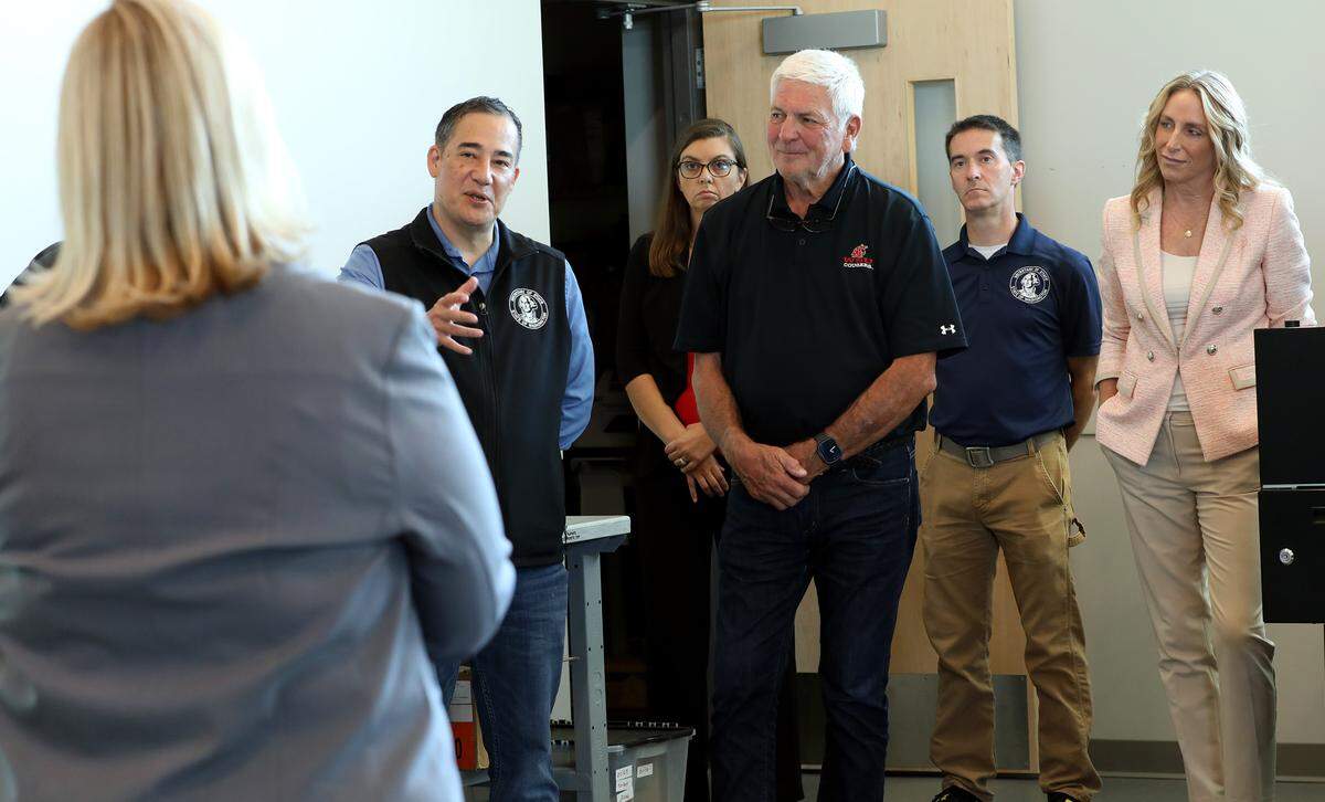 Washington Secretary of State Steve Hobbs, second from let, asks Benton County Auditor Brenda Chilton a question Thursday morning during a tour of the Benton County Elections Center in Kennewick. Standing nearby, from left, are: Benton County elctions manager Amanda Hatfield, Sen. Perry Dozier, R-Walla Walla, Shawn Merchant, policy director for the Washington Secretary of State and Rep. Stephanie Barnard, R-Pasco.