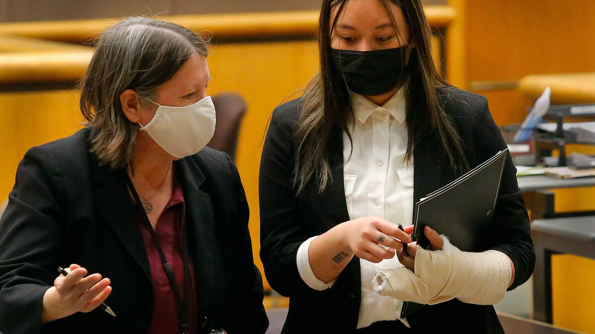 Jennifer Ana Duong, the 19-year driver charged with death of her three passengers in the early Sunday high-speed crash in Richland, walks out of a Benton County Superior courtroom with her defense attorney, Shelley Ajax, following her Thursday hearing.