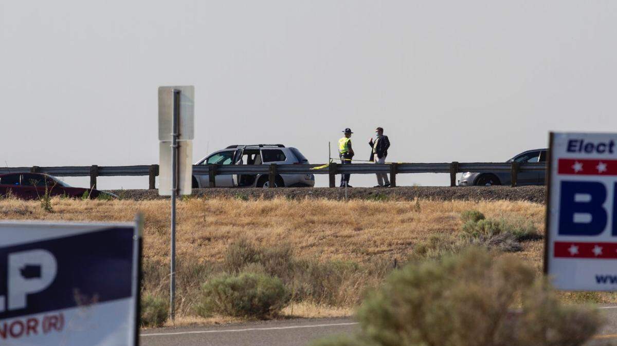 Police investigate an officer-involved shooting that occurred during a traffic stop on the Interstate 182 ramp from Road 68 in Pasco around 3 p.m. Thursday, July 30.