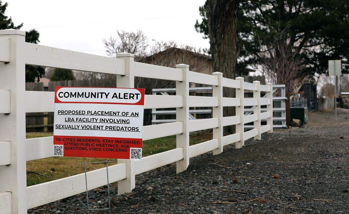 Neighbors in the area off West Eighth Avenue have placed numerous signs opposing the decision to allow a home for sex offenders. The split-level home at the corner of Edison and Eighth Avenue is being converted into housing for sex offenders leaving a special commitment center on McNeil Island.