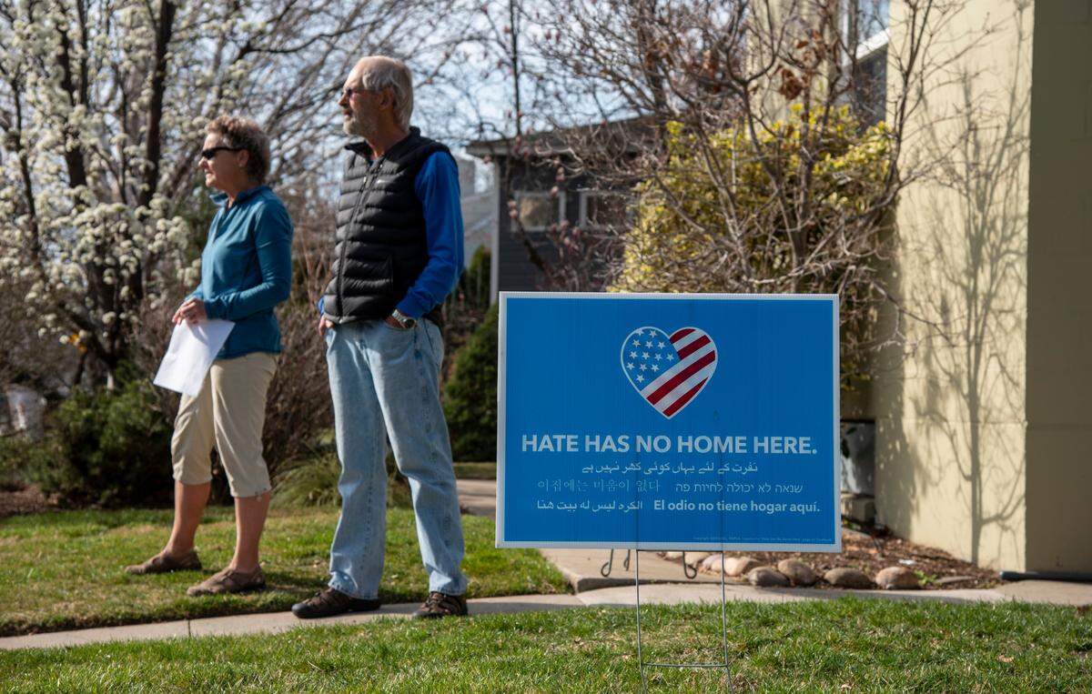 Karen Nelson, left, and David Harvey stand outside their home in Richland where they are block stewards in a neighborhood care initiative aimed at helping people during the coronavirus outbreak.