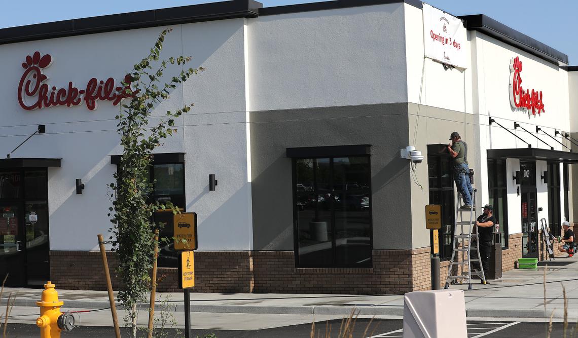 Workers are cleaning and taking care last-minute details at the new Kennewick Chick-fil-A.