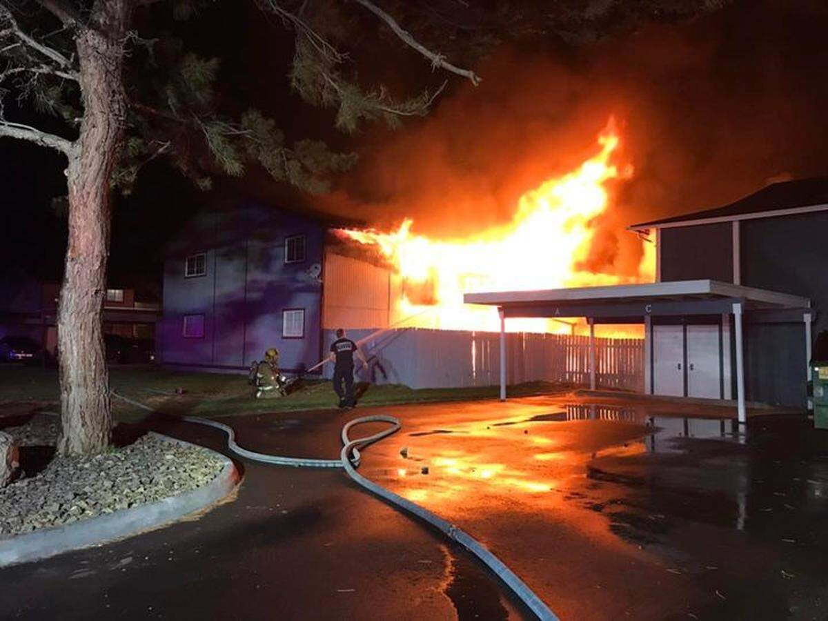 A fire early Sunday, March 13, 2022, spread from one fourplex to another on West Albany Avenue in Kennewick.