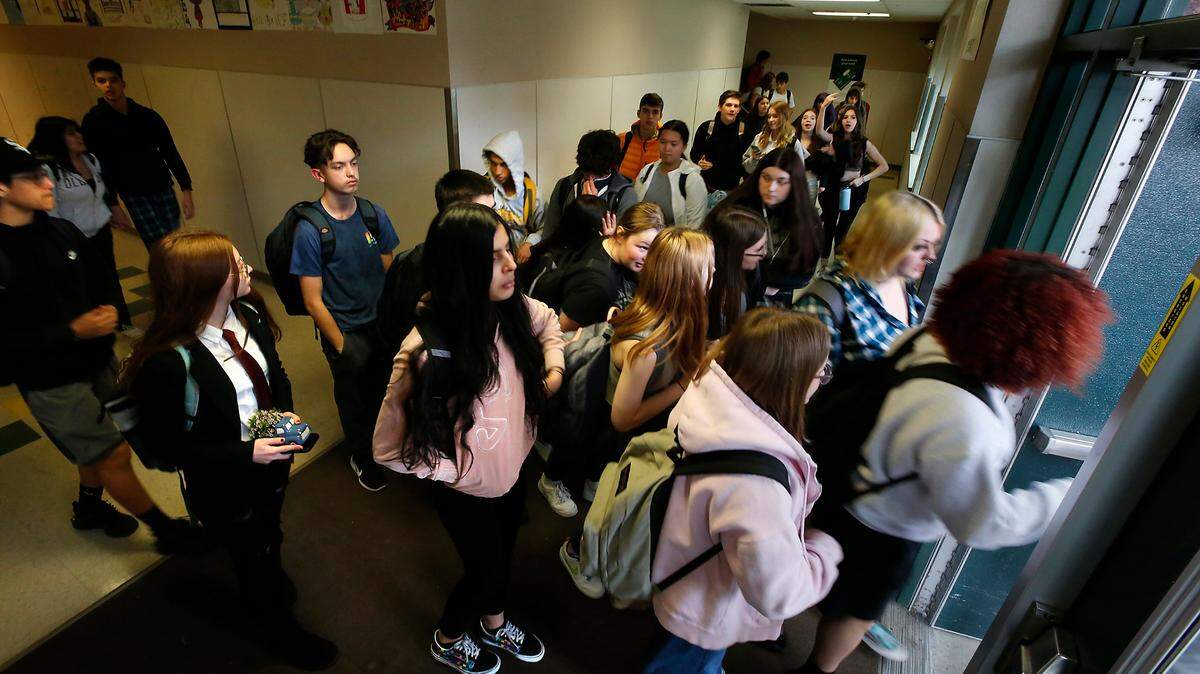 Converging hallways at Richland High School create congestion for students as they head home from classes.