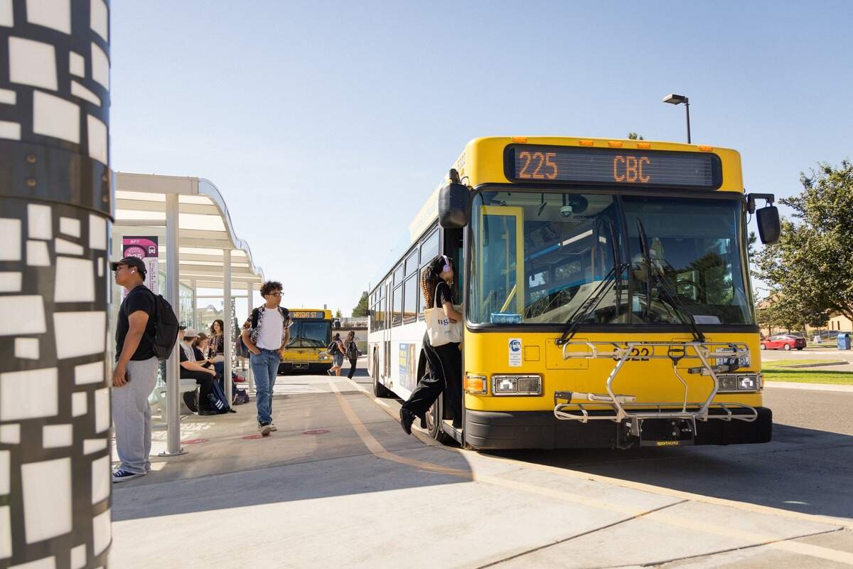 Passengers boarding a Ben Franklin Transit bus.