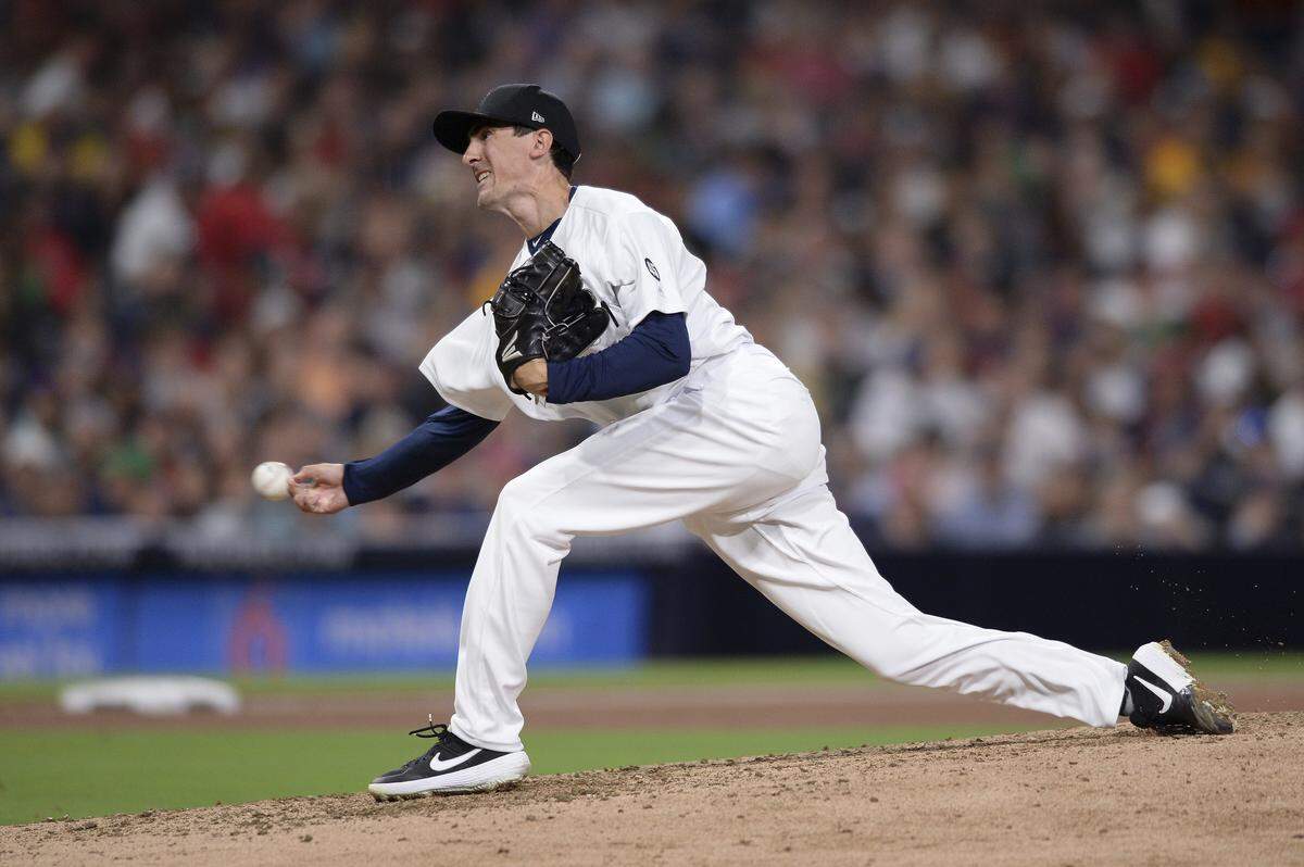San Diego Padres relief pitcher Eric Yardley works against a Boston Red Sox batter during the seventh inning of the baseball game Friday, Aug. 23, 2019, in San Diego. (AP Photo/Orlando Ramirez)