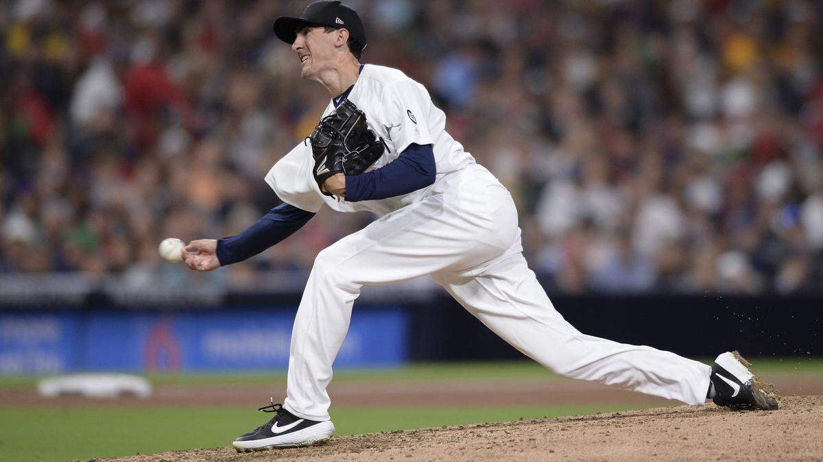 San Diego Padres relief pitcher Eric Yardley works against a Boston Red Sox batter during the seventh inning of the baseball game Friday, Aug. 23, 2019, in San Diego. (AP Photo/Orlando Ramirez)