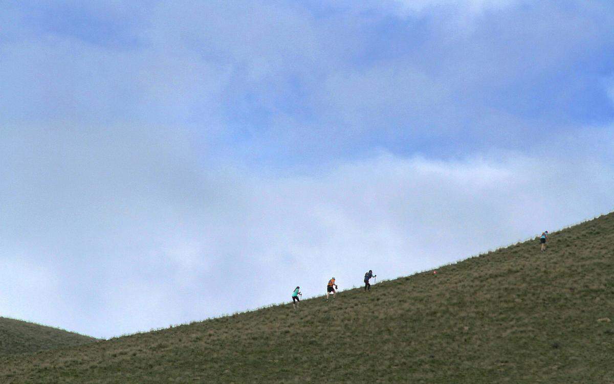Hikers climb the hill off McBee Grade Road near Benton City during a Badger Mountain Challenge race.