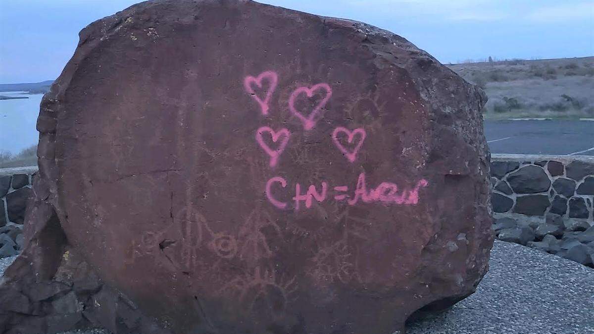 A rock with petroglyphs at Indian Memorial Park at Ice Harbor Lock and Dam was vandalized with pink spray paint.
