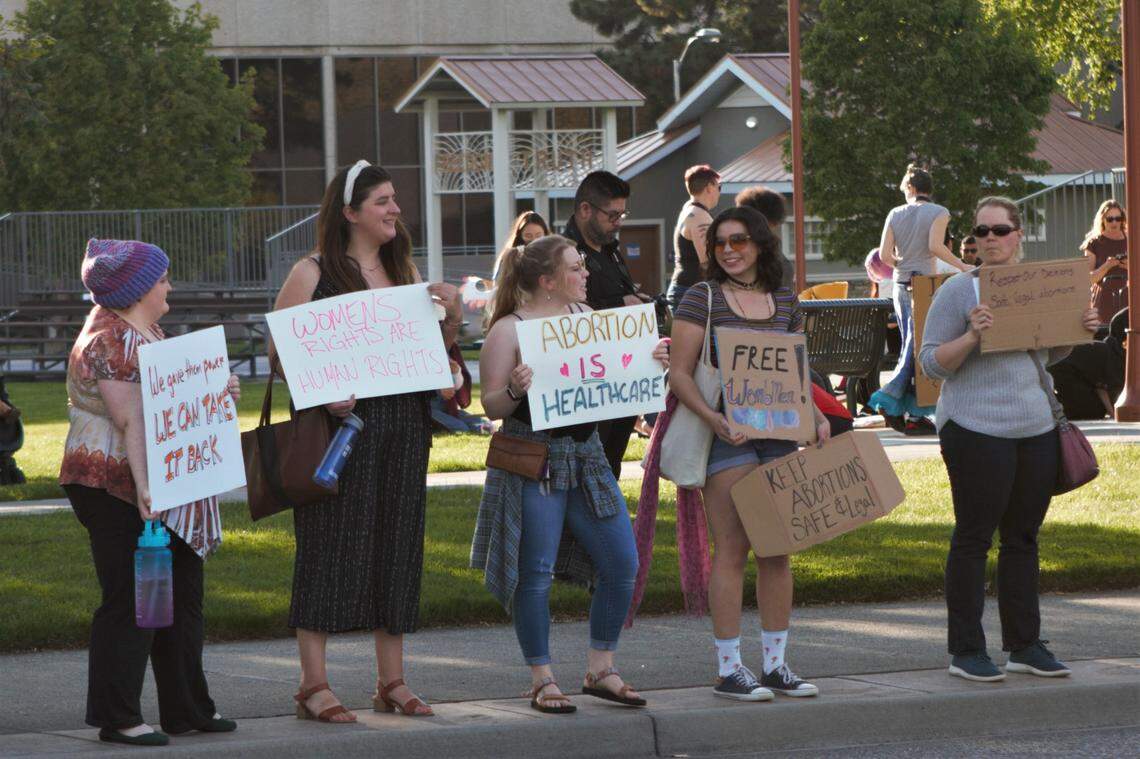 Protesters demonstrating in support of abortion rights lined the sidewalks along both sides of George Washington Way in Richland.