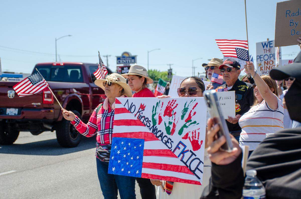 Thousands gathered Saturday, June 14, along Columbia Center Boulevard in Kennewick, Washington, for the nationwide “No Kings” protest. They demonstrated against President Donald Trump’s policies and against arrests made in the Hispanic community by U.S. Immigration and Customs Enforcement, or ICE.