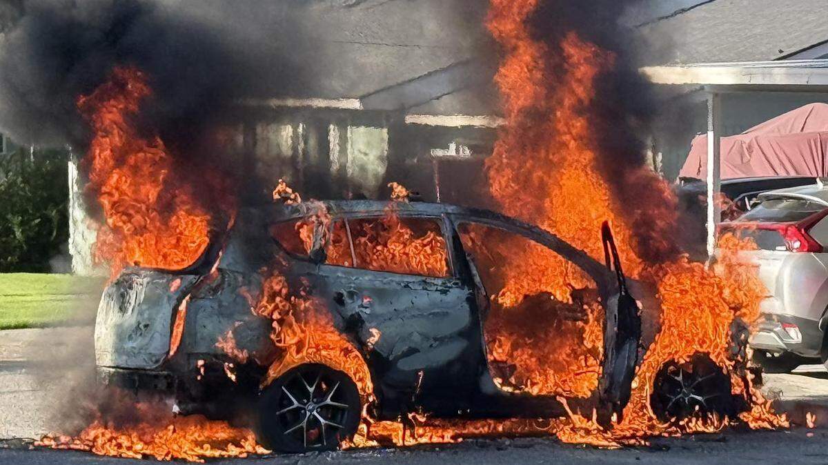 A vehicle burns near Road 44 and Pearly street in Pasco’s Riverview neighborhood Sunday morning.