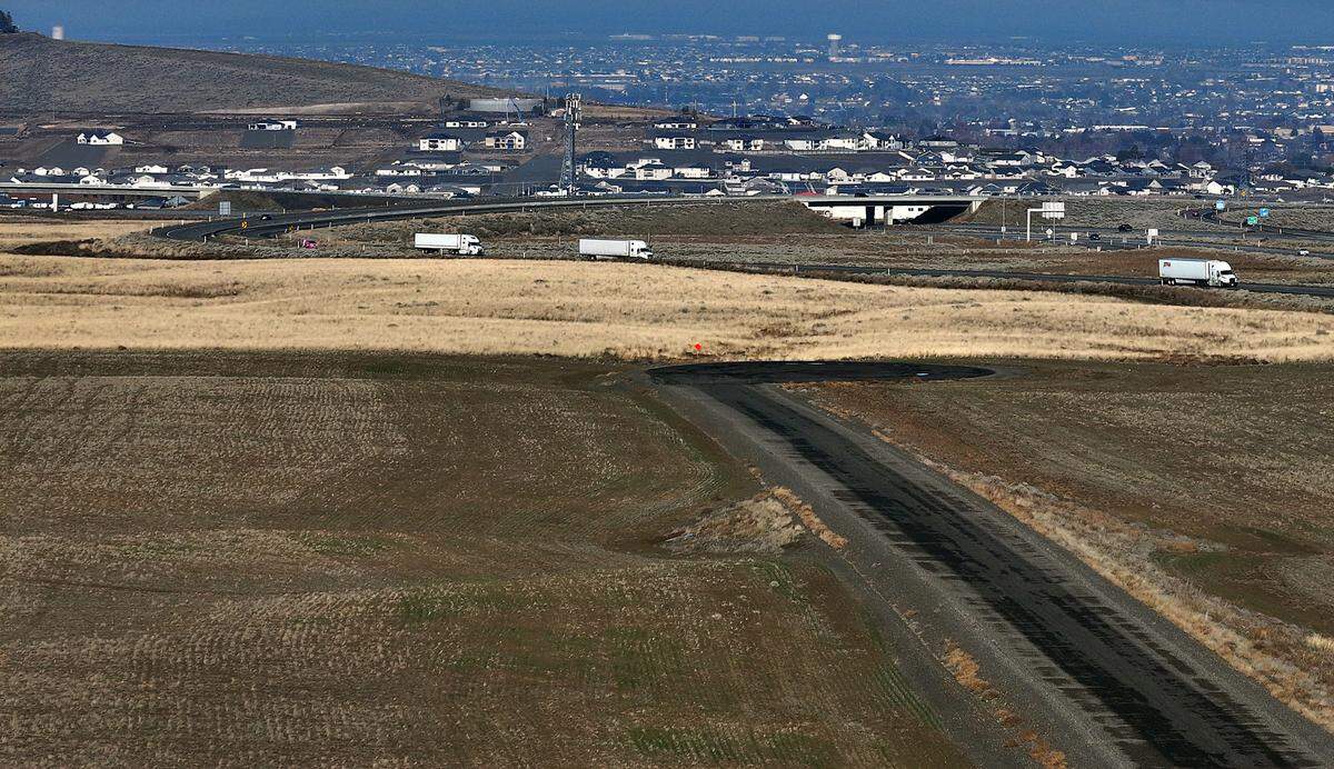 Adair Road in Benton County ends just south of the I82 and Highway 395 interchange just south of Kennewick. The Christenson Road overpass is at the far left of the image.