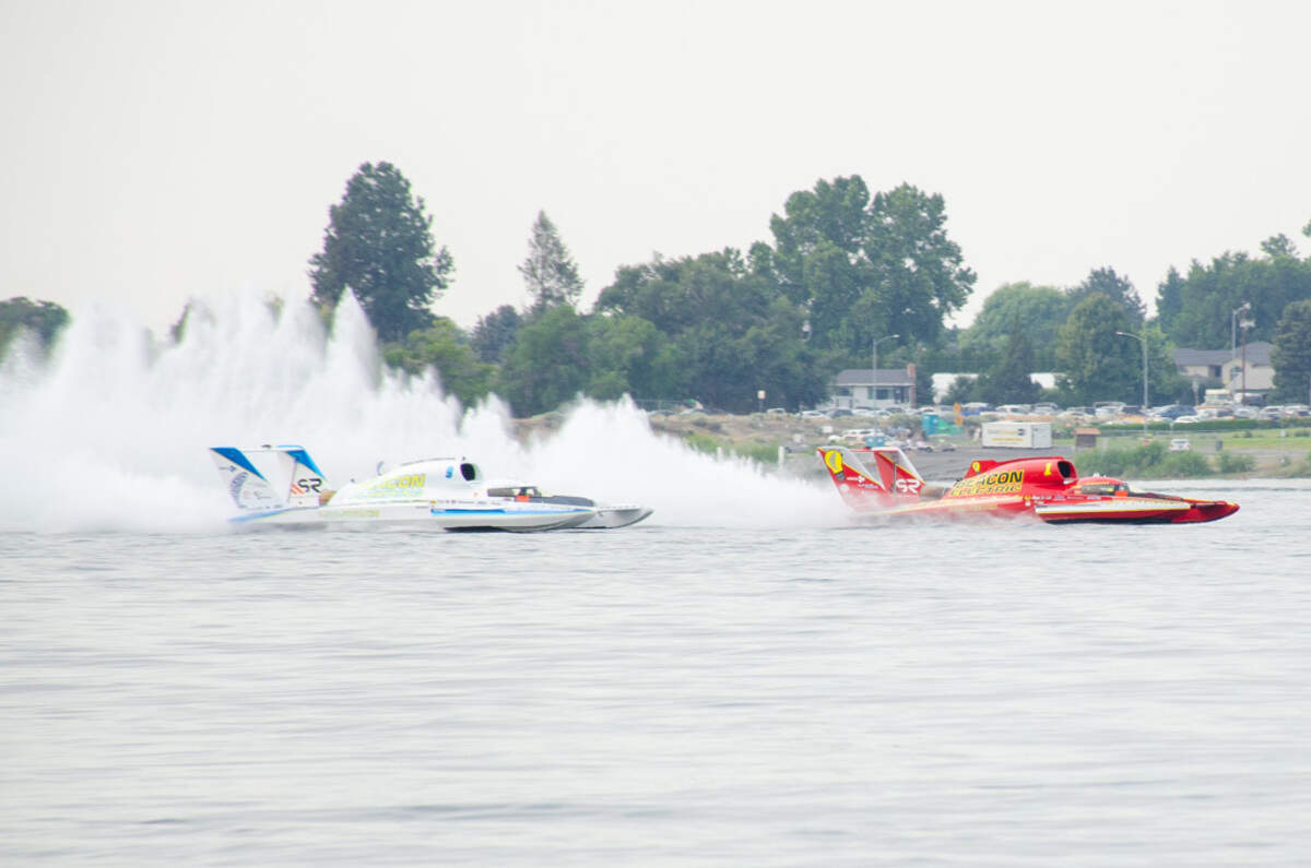 J. Michael Kelly in the U-1 Beacon Electric leads Corey Peabody in the U-9 Beacon Plumbing hydroplane shortly before a flip Saturday, July 27, at the 2024 Water Follies Apollo Columbia Cup in Kennewick, Washington.