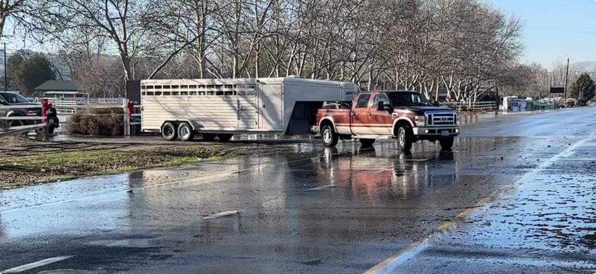A stream of pickups hauling horse trailers carrying their animals to safety were pulling out of the equestrian boarding and riding facility at the Richland Riders Club on Van Giesen Street in Richland before noon Saturday.