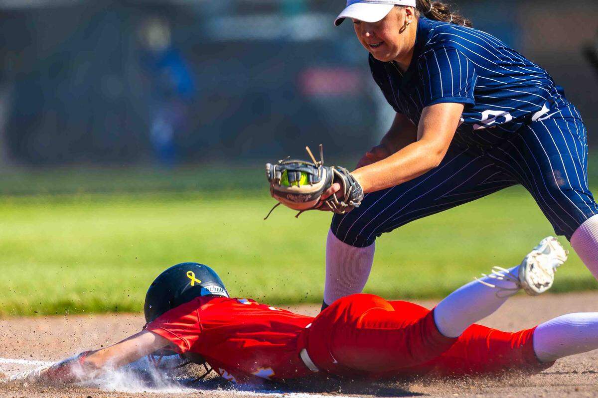 A Kamiakin softball player slides into base during the WIAA Class 4A state softball championships tournament on May 22, 2026.