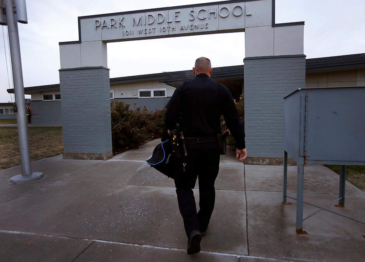 School Resource Officer Richard Sanders, with the Kennewick Police Department, arrivies on a recent chilly morning for a work shift at Park Middle School in Kennewick. Sanders splits his coverage as an SRO at both Park and Horse Heaven Hill Middle schools.