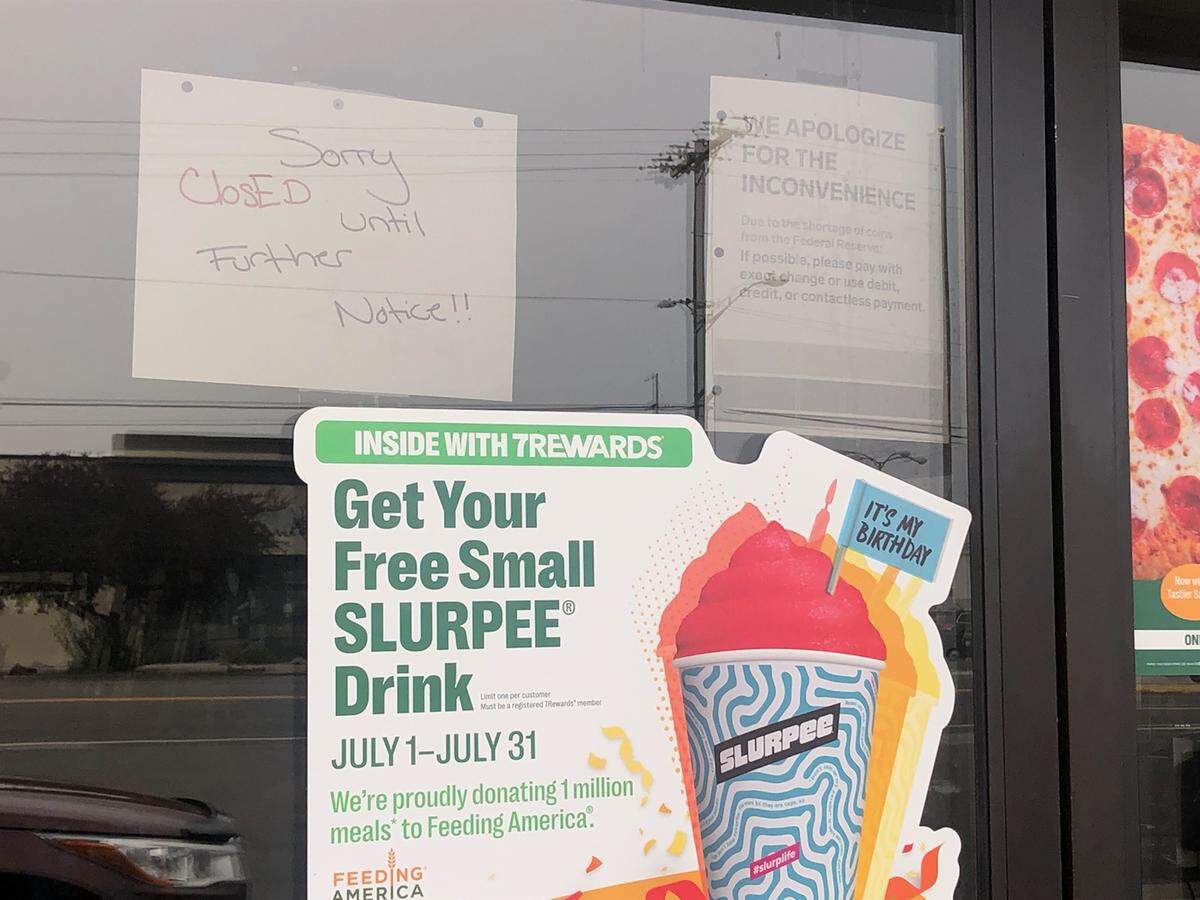 A sign at the 7-Eleven store on Clearwater Avenue in Kennewick, WA, says that the store is closed until further notice.