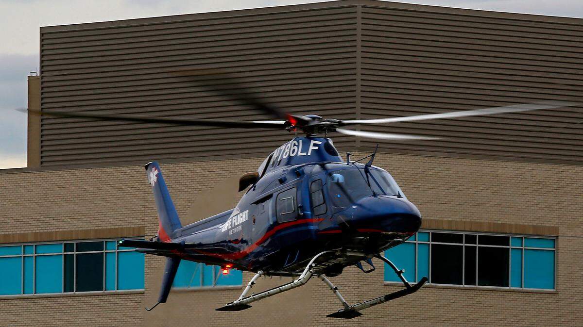 A Life Flight medical helicopter approaches the landing pad.