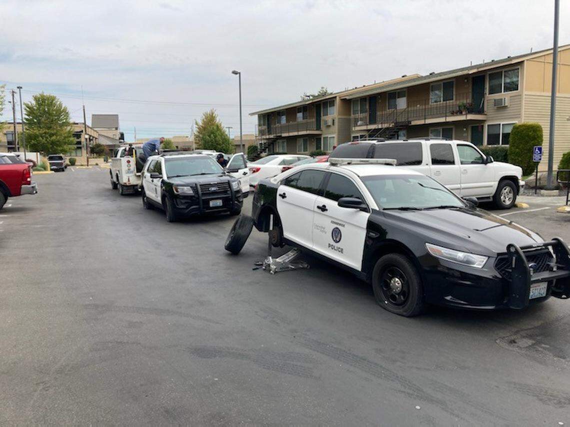 A Kennewick woman is in jail after stabbing nine tires across three patrol cars in Kennewick,