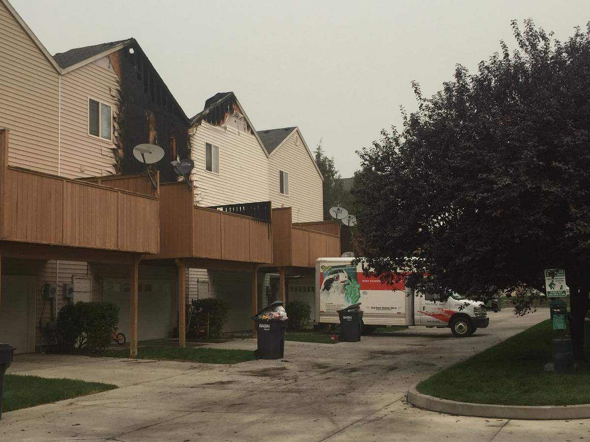 A fire in a townhouse complex forced several people out Wednesday night after something caught fire on a porch outside of the house.