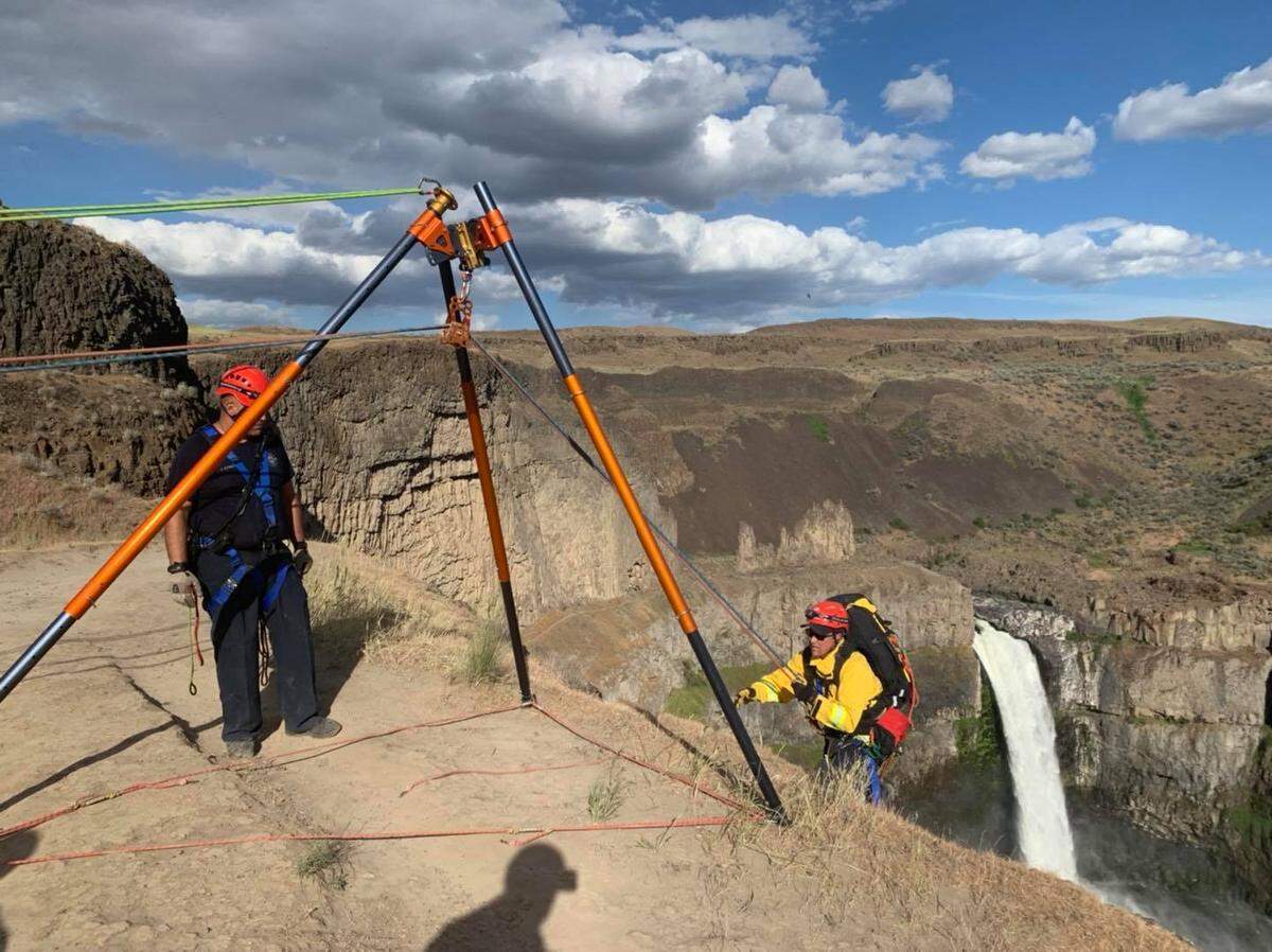 Emergency crews with Franklin County Fire District 3 and other agencies work to rescue a hiker at Palouse Falls State Park.