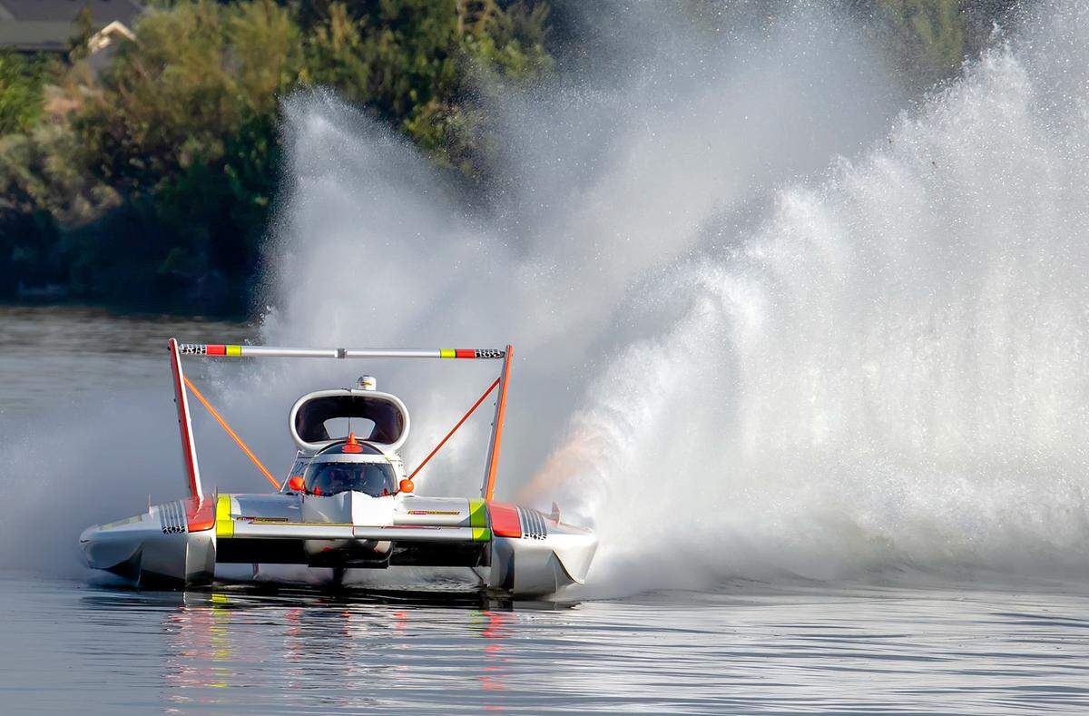 Vanessa and Darrell Strong are the new owners of this hydroplane shown on the Columbia River.