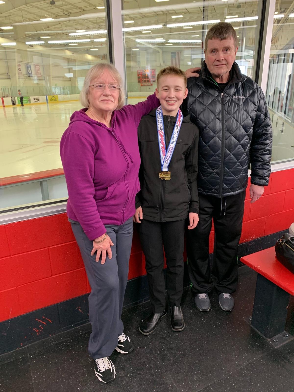 Roy Albertson, right, was a former assistant coach for the legendary Ed Troxel at Kennewick High from 1979 to 1995. Albertson, pictured with his wife Pat and grandson Cooper Leonard, stepped down as head coach at Timberlake High School in North Idaho.