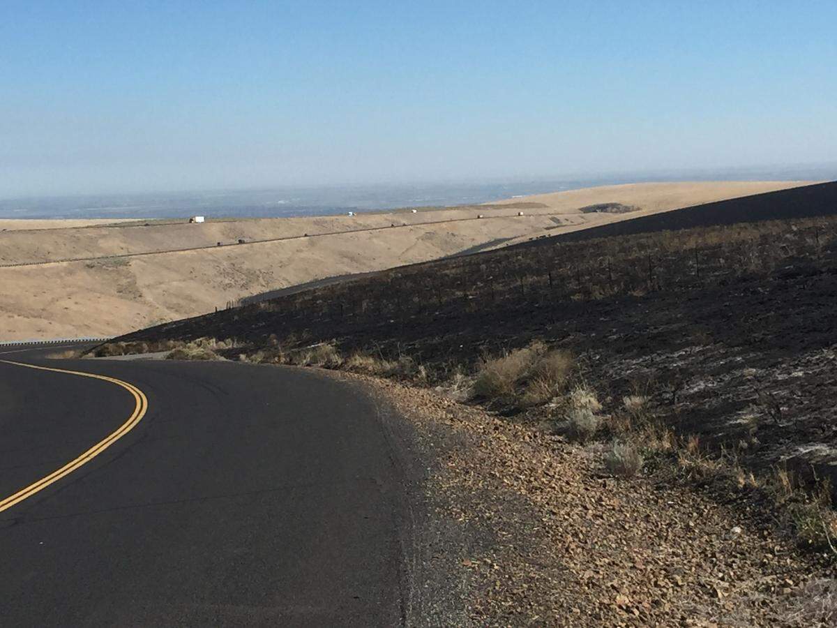 The fire south of Kennewick on Sunday burned about 600 acres near Highway 395.