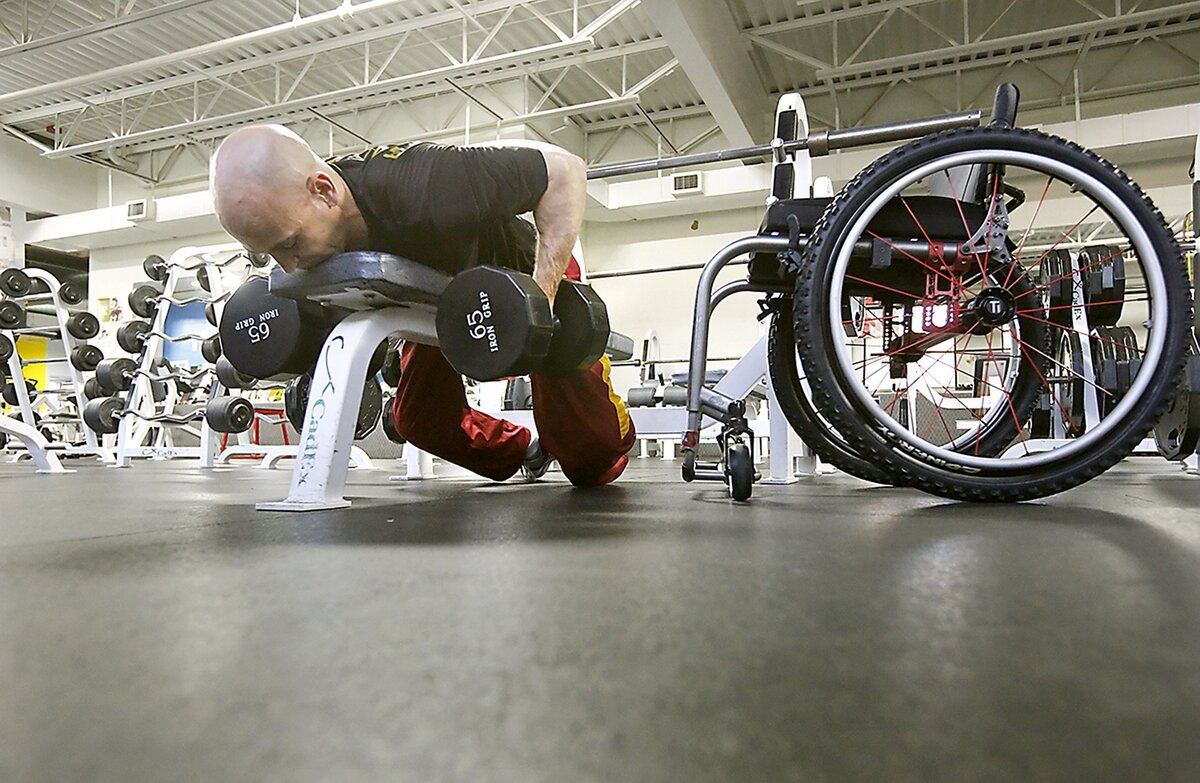 Paralympian hopeful Nate Higgins recently works out as part of his preparation for traveling to the Olympic Training Center in Colorado Springs. It ‘s the second time for him attempting to make the team. The first time was for swimming and this time is for the shot put event.