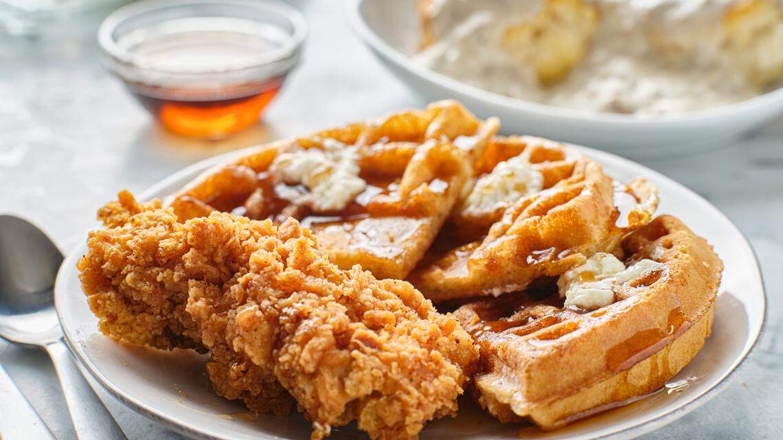 An image of chicken and waffles. .