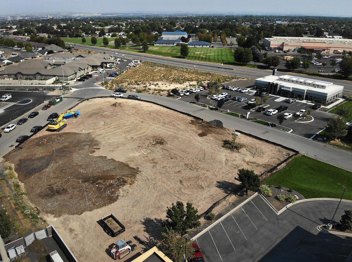 Retail space and senior housing units are planned for these two lots on the corner of West 24th Avenue and Quillan Place in Kennewick.