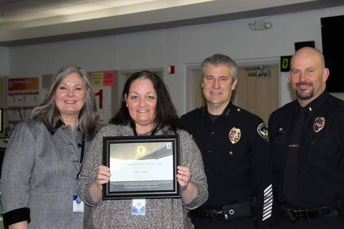 Richland City Manager Cindy Reents, left, Interim Police Chief Jeff Taylor and Lt. Chris Lee praised dispatcher Colleen Jackson, second from left, for her handling of the 45-minute phone call from murder suspect William C. Lee.