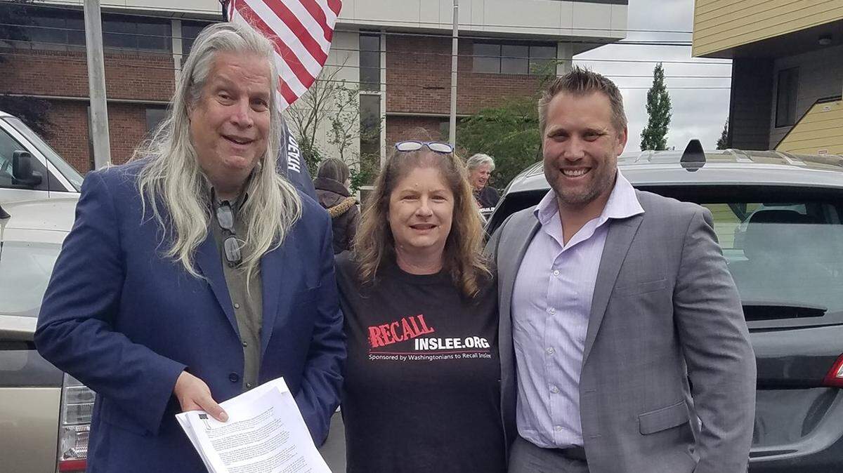 Pasco City Councilman Pete Serrano, at right, posted this photo Monday on his Facebook page when a new petition was filed to recall Washington Gov. Jay Inslee.