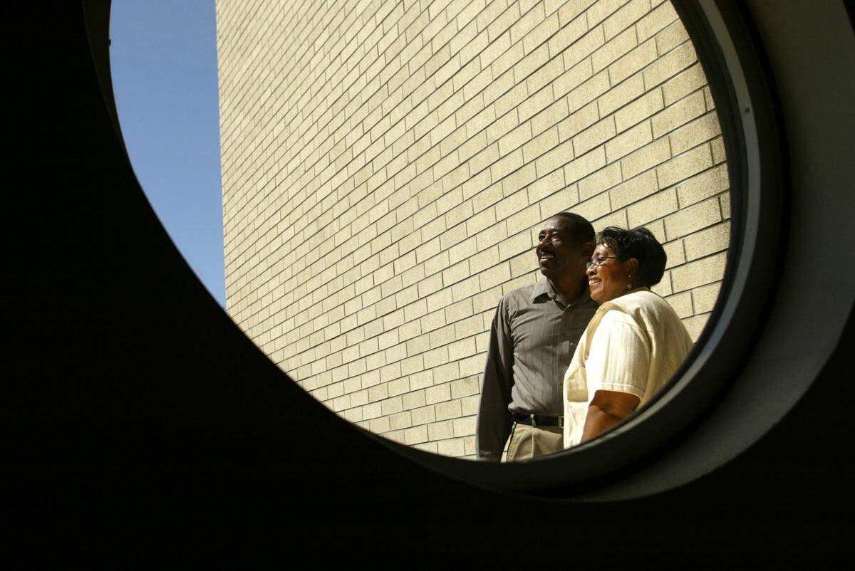 One of the founders of Afro-Americans for an Academic Society (AAAS), Clarence Alford, and board member Katie Jackson stand outside the building where the organization was conceptualized 30 years ago.