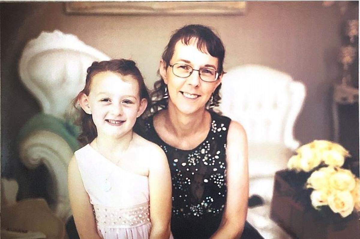 Michelle L. Scheuerman, 48, died three days after her Ford Mustang was involved in a fatal collision on Interstate 182 in Pasco. She is pictured with her granddaughter, Sophia, who was the love of her life.